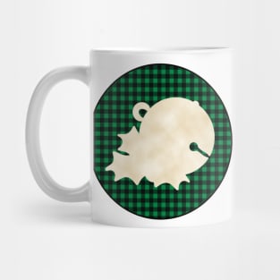 Sleigh bell and mistletoe over a black and green tile pattern Mug